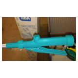 Outdoor Garden Hose hanger, spray wand, rain gauge.