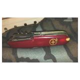 Camo Zip-up Hoodie (M), Arm Guard, Multi-tool.