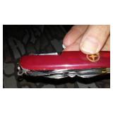 Camo Zip-up Hoodie (M), Arm Guard, Multi-tool.