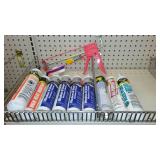Caulking Assortment (9) and Gun. Dap, GE.