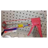 Caulking Assortment (9) and Gun. Dap, GE.