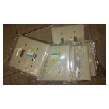 Assorted Almond Wall Plate Covers.