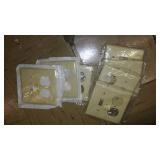 Assorted Almond Wall Plate Covers.