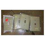 Assorted Almond Wall Plate Covers.