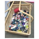 Collection of Sewing Thread Spools with Wicker Storage Basket and Sewing Stool