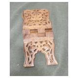 White Milk Glass Vase and Ornate Wooden Book Stand