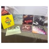 Collection of 7 Vintage Vinyl Records Featuring Cheech & Chong, Billy Joel, and Jimi Hendrix