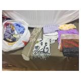 Collection of Assorted Fabric Pieces and Scarves