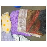 Collection of Assorted Fabric Pieces and Scarves