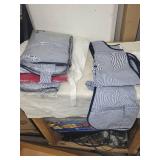 Set of Unopened Blue Pinstripe Aprons and Bibs