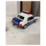 Set of Toy Vehicles and Modern Art Lamp Shade