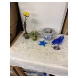 Collection of Decorative Items: Blue Glass Fish, Yellow Metal Flowers, and More