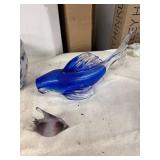 Collection of Decorative Items: Blue Glass Fish, Yellow Metal Flowers, and More