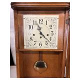 Vintage Wall Clock with Pendulum and Ornate Detailing