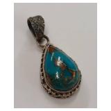 Sterling Silver Turquoise Pendant with Intricate Design