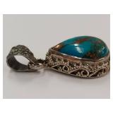 Sterling Silver Turquoise Pendant with Intricate Design