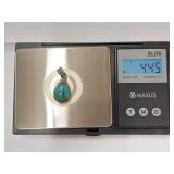 Sterling Silver Turquoise Pendant with Intricate Design