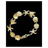 Exquisite 7-inch 14K Gold Ocean Themed Tennis Bracelet (9 grams)