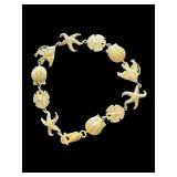 Exquisite 7-inch 14K Gold Ocean Themed Tennis Bracelet (9 grams)