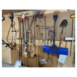 Garage Wall Full of Yard Tools - Shovels, Rakes, Weed Whippers, Saws, and More!