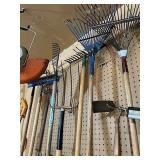 Garage Wall Full of Yard Tools - Shovels, Rakes, Weed Whippers, Saws, and More!