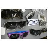25 pair of adult sunglasses (a couple are readers)