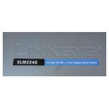 group of electronics - switch, 6 remotes, usb drives, webcam, laptop drives