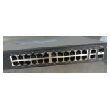 group of electronics - switch, 6 remotes, usb drives, webcam, laptop drives