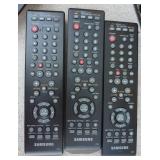 group of electronics - switch, 6 remotes, usb drives, webcam, laptop drives