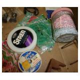 Beadwork supplies, handiwork, décor, water bottles all in a crate