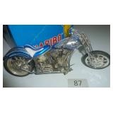 Toy motorcycle, quite heavy, about 8 inches long