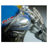 Toy motorcycle, quite heavy, about 8 inches long