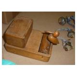 Group of vintage items including wood bird toothpick holder, cast iron bells, mini wood shaver