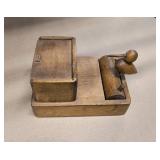 Group of vintage items including wood bird toothpick holder, cast iron bells, mini wood shaver