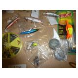 Lot of fishing lures and spinning reel (missing handle)