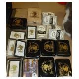 18 Decks of new playing cards, some with tins to keep your cards in