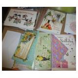 Approx 100 greeting cards and new food container for cereal or pasta