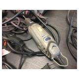 4 Dremel/Type Tools with a bunch of bits