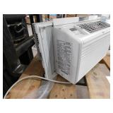 LG 6,000 BTU 115-Volt Window Air Conditioner Cools 250 sq. ft with Remote and Dehumidifier in White