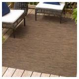 Ethan Modern Flatweave Brown 8 ft. x 10 ft. Solid Indoor/Outdoor Area Rug by JONATHAN Y  Customer Returns See Pictures