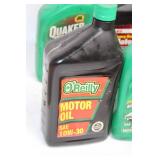 Collection of 9 Quarts of Motor Oil (Quaker State & O