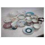 Collection of Vintage Porcelain Cups and Saucers with Floral and Ornate Designs
