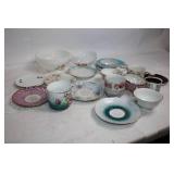 Collection of Vintage Porcelain Cups and Saucers with Floral and Ornate Designs