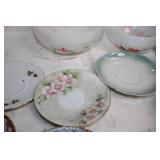 Collection of Vintage Porcelain Cups and Saucers with Floral and Ornate Designs