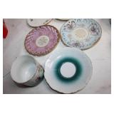 Collection of Vintage Porcelain Cups and Saucers with Floral and Ornate Designs