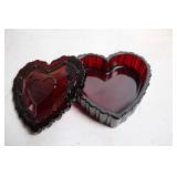 Collection of Ruby Red Glassware Including Goblets, Candlesticks, and Decorative Pieces