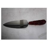 Collection of Ruby Red Glassware Including Goblets, Candlesticks, and Decorative Pieces