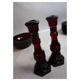 Collection of Ruby Red Glassware Including Goblets, Candlesticks, and Decorative Pieces