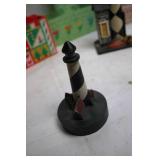 Collection of Needlepoint Baskets and Lighthouse Figurines