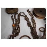 Collection of Antique Pulleys, Hooks, and Chains